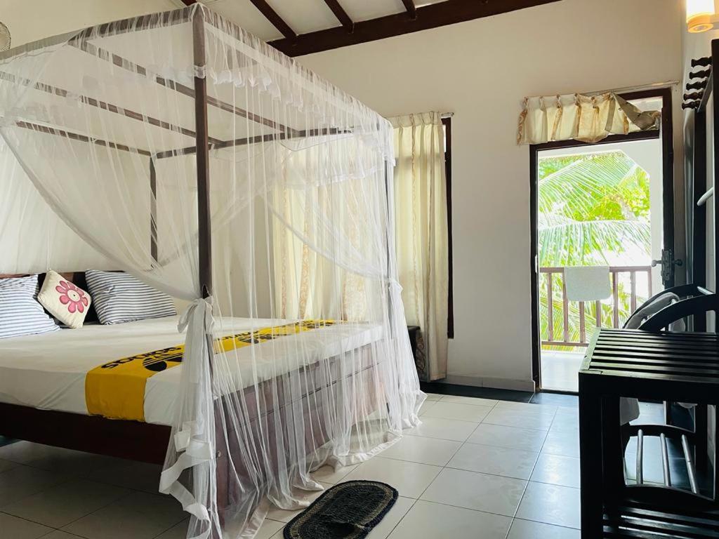 Hotel Rainbow Surf Beach Koggala Pokoj fotografie